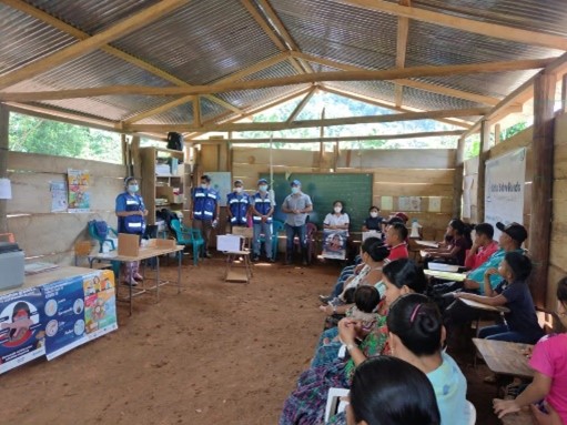 Mobile brigade health personnel, Guatemalan Ministry of Health, PAHO, UNICEF, and US Embassy staff at the meeting in Tactic, Alta Verapaz (Credit: WHO/PAHO Guatemala)